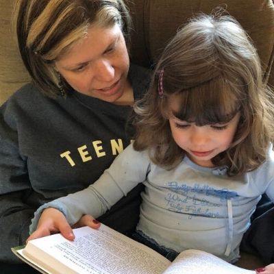 Reading aloud to my daughter.