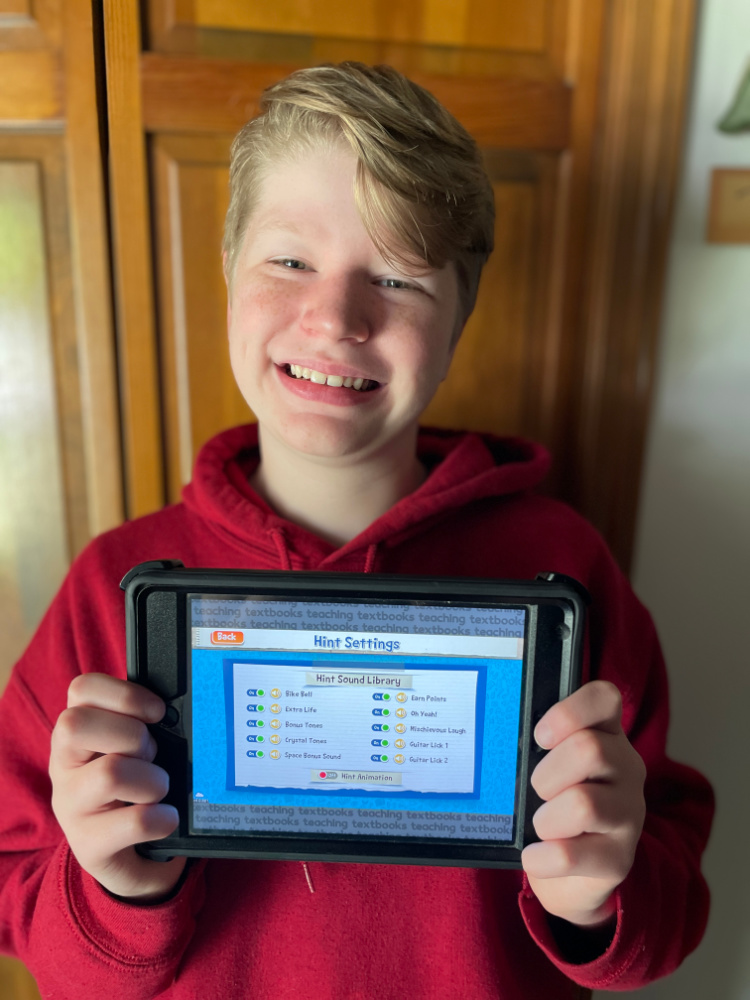My homeschooled kids share why they love Teaching Textbooks and their favorite parts of this online homeschool math program.